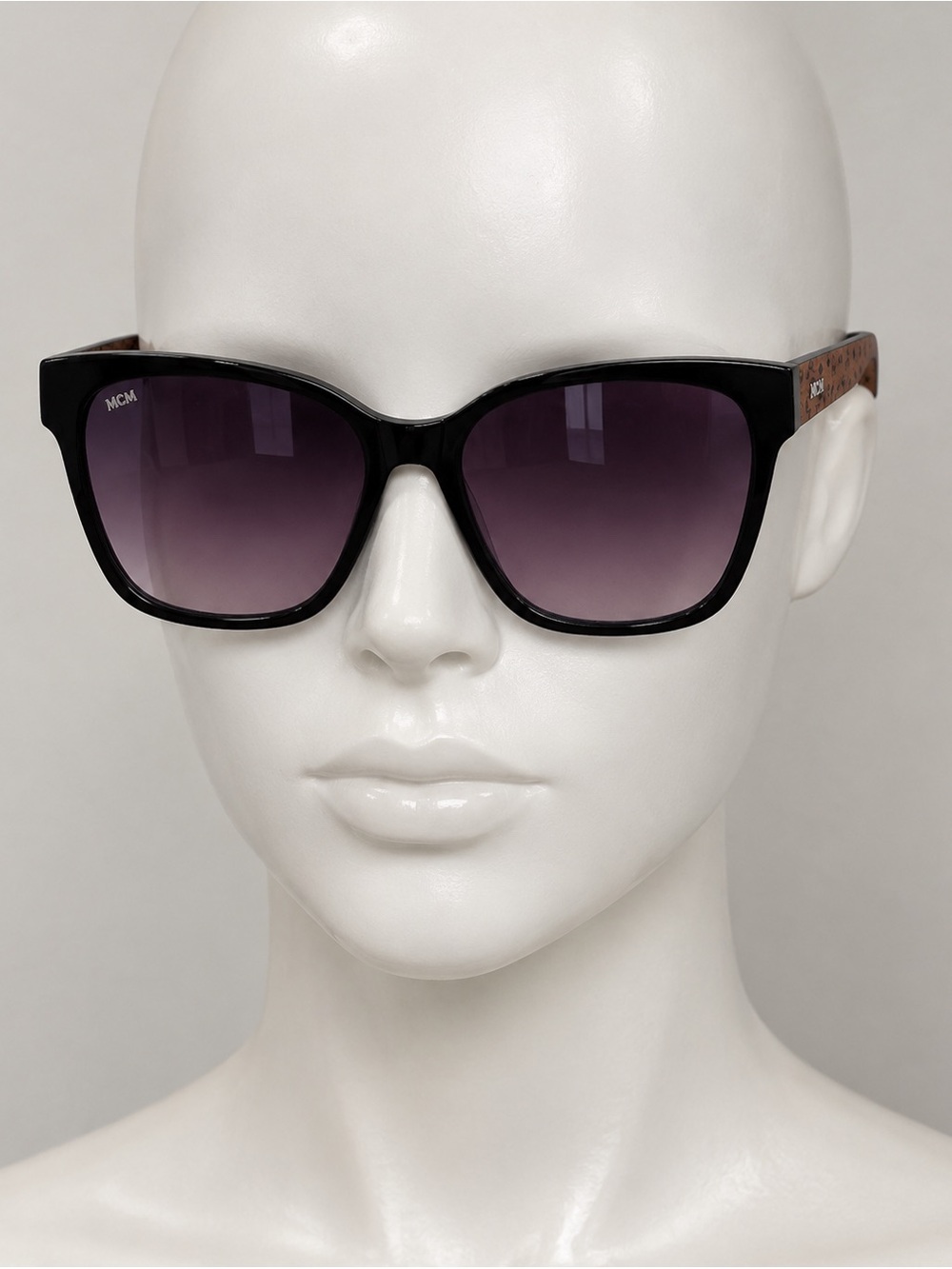 MCM Black Frame Sunglasses with Purple Gradient Lenses